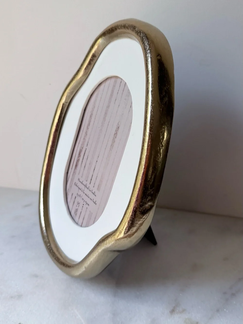 Organic gold metal irregular oval shape picture frame